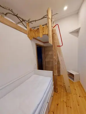 Ein Bett oder Betten in einem Zimmer der Unterkunft elephants Ferienhaus Haus Ost