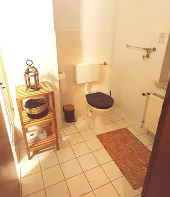 Ein Badezimmer in der Unterkunft Stadthotel