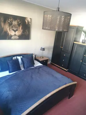 Ein Bett oder Betten in einem Zimmer der Unterkunft Stadthotel