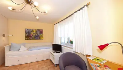 Ein Bett oder Betten in einem Zimmer der Unterkunft Landgasthaus Ziegelscheune
