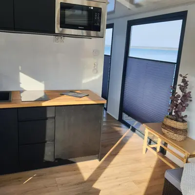 Küche/Küchenzeile in der Unterkunft schwimmendes Ferienhaus Silent