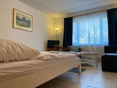 Ein Bett oder Betten in einem Zimmer der Unterkunft Kapitänshaus