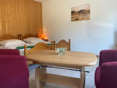 Ein Bett oder Betten in einem Zimmer der Unterkunft Kapitänshaus
