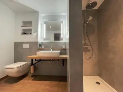 Ein Badezimmer in der Unterkunft Hotel am Sonnenlandpark
