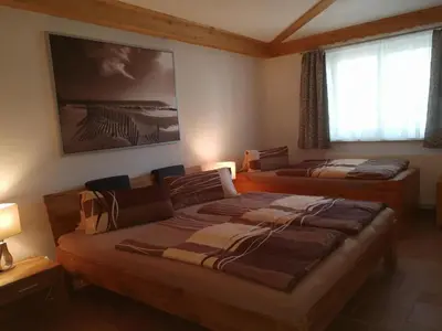 Ein Bett oder Betten in einem Zimmer der Unterkunft Ferienwohnung 3 - a63699