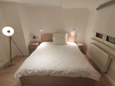 Ein Bett oder Betten in einem Zimmer der Unterkunft Precioso apartamento, fantásticas vistas