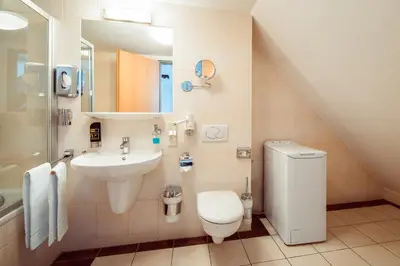 Ein Badezimmer in der Unterkunft Familienapartment Am Neumarkt lll