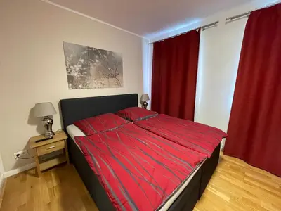 Ein Bett oder Betten in einem Zimmer der Unterkunft Elbtalblick Königstein im Deutschen Haus