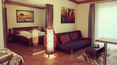 Ein Bett oder Betten in einem Zimmer der Unterkunft Fewo 4