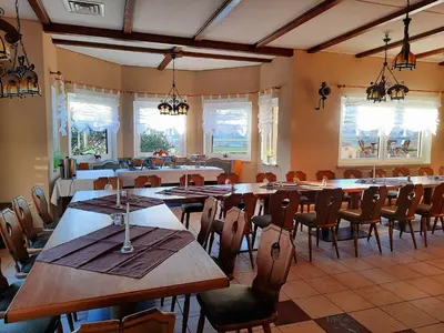 Ein Restaurant oder anderes Speiselokal in der Unterkunft Reiterhof Schmidt, Gaststätte & Pension