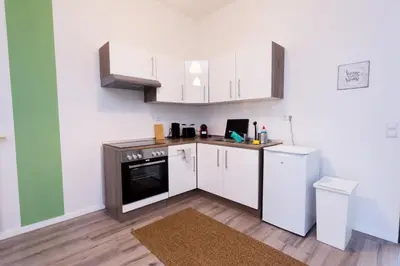 Küche/Küchenzeile in der Unterkunft FullHouse - Chemnitz - R11 Apartments - Marketplace