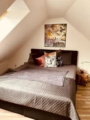 Ein Bett oder Betten in einem Zimmer der Unterkunft Auszeit Chemnitz