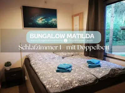 Ein Bett oder Betten in einem Zimmer der Unterkunft Bungalow Matilda