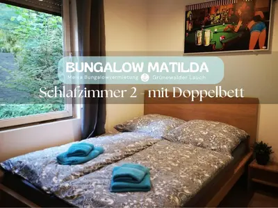 Ein Bett oder Betten in einem Zimmer der Unterkunft Bungalow Matilda