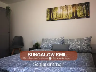 Ein Bett oder Betten in einem Zimmer der Unterkunft Bungalow Grünewalder Lauch