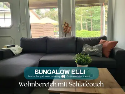 Ein Sitzbereich in der Unterkunft Bungalow Grünewalder Lauch