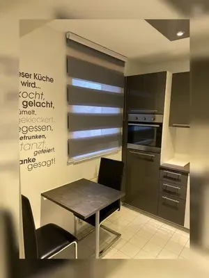 Ein Sitzbereich in der Unterkunft Ferienwohnung Pfarrlehn
