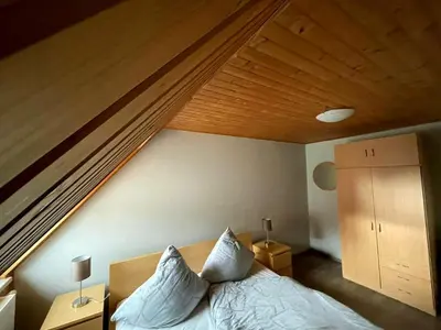 Ein Bett oder Betten in einem Zimmer der Unterkunft Pension Riegler