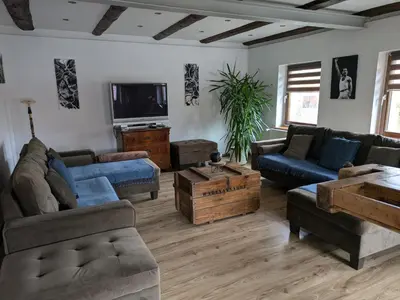 Ein Sitzbereich in der Unterkunft Ferienhaus -Am alten Dorfplatz-