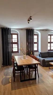 Ein Sitzbereich in der Unterkunft Ferienwohnung Villa Fortuna