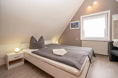 Ein Bett oder Betten in einem Zimmer der Unterkunft Ferienhaus Glöckner