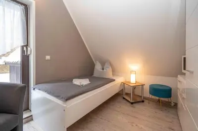 Ein Bett oder Betten in einem Zimmer der Unterkunft Ferienhaus Glöckner