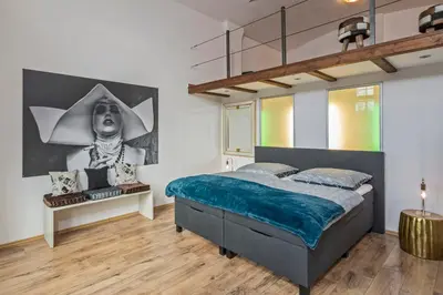 Ein Bett oder Betten in einem Zimmer der Unterkunft Loft im Denkmal