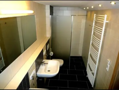 Ein Badezimmer in der Unterkunft guesthouse Elbsandstein Appartement Lilienstein