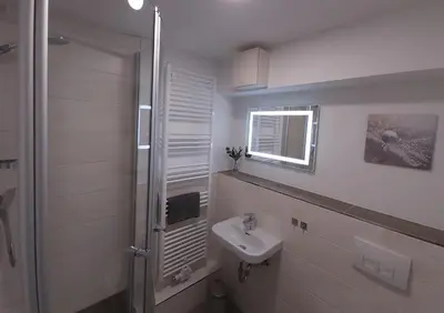 Ein Badezimmer in der Unterkunft Pension zur Eiche GmbH