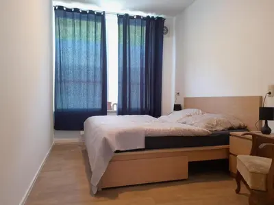 Ein Bett oder Betten in einem Zimmer der Unterkunft City Apartment #1 bei der Porzellan Manufaktur