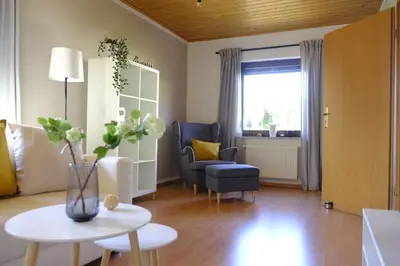 Ein Sitzbereich in der Unterkunft Ferienhaus am Hainberg