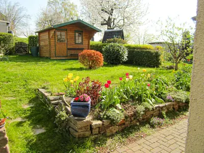 Ein Garten an der Unterkunft Ferienhaus am Hainberg