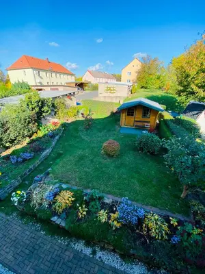 Ein Garten an der Unterkunft Ferienhaus am Hainberg