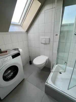 Ein Badezimmer in der Unterkunft FEWO 