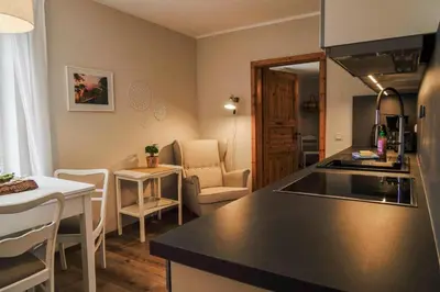 Ein Sitzbereich in der Unterkunft Urlaubsfreude Biedermann Haus GlücksStein Sandstein