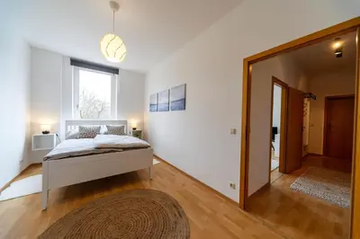 Ein Bett oder Betten in einem Zimmer der Unterkunft Im HYGGE skandinavisch wohnen mitten in Chemnitz