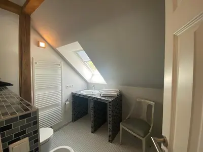 Ein Sitzbereich in der Unterkunft Altes Pfarrhaus Kurort Gohrisch - Ferienwohnungen - Gartensauna - Parkplätze