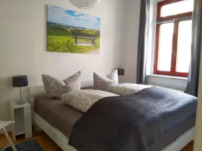 Ein Bett oder Betten in einem Zimmer der Unterkunft Ferienwohnung William