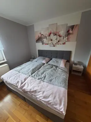 Ein Bett oder Betten in einem Zimmer der Unterkunft Ferienhaus Am Pilgerweg