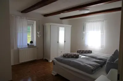 Ein Bett oder Betten in einem Zimmer der Unterkunft Ferienhof Wiesenblick