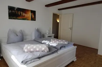 Ein Bett oder Betten in einem Zimmer der Unterkunft Ferienhof Wiesenblick