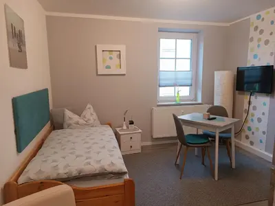 Ein Bett oder Betten in einem Zimmer der Unterkunft Apartment 