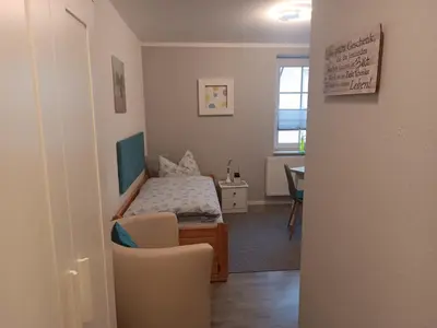 Ein Bett oder Betten in einem Zimmer der Unterkunft Apartment 