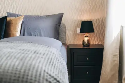 Ein Bett oder Betten in einem Zimmer der Unterkunft TIP! Modernes 90 qm City-Apartment mit Stil & Komfort in Toplage