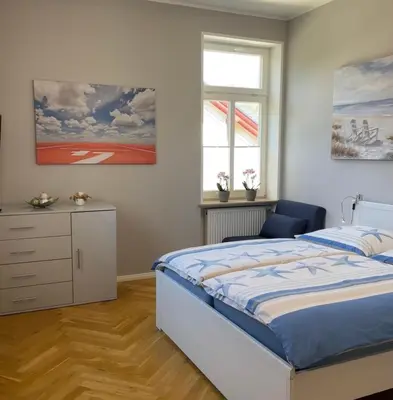 Ein Bett oder Betten in einem Zimmer der Unterkunft Helle Terrassenwohnung in Traumlage von Dresden