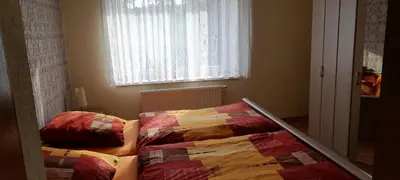 Ein Bett oder Betten in einem Zimmer der Unterkunft Kockscher Hof
