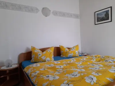 Ein Bett oder Betten in einem Zimmer der Unterkunft Falkenstein