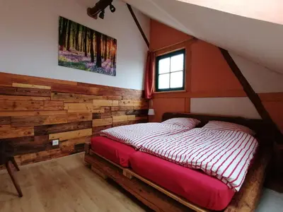 Ein Bett oder Betten in einem Zimmer der Unterkunft Ferienwohnung Villa Claudia