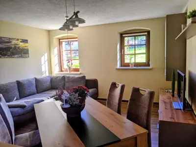 Ein Sitzbereich in der Unterkunft Ferienwohnung Aus-Zeit auf dem Lande