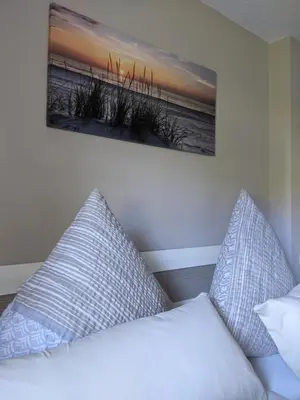 Ein Bett oder Betten in einem Zimmer der Unterkunft Ferienwohnung Aus-Zeit auf dem Lande
